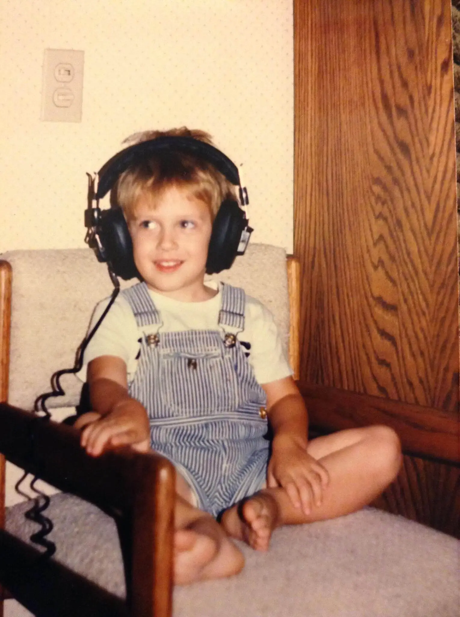 Photo of Dustin as a child with retro headphones
